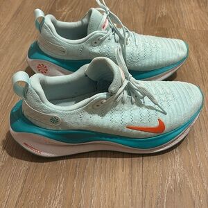 Blue Nike React X Infinity Run 4. Light blue and orange